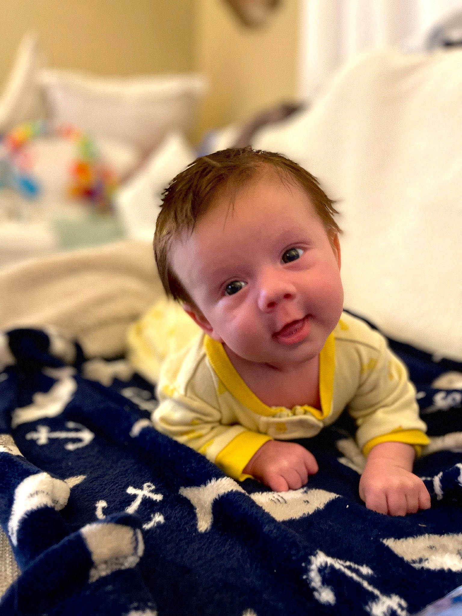 Fisher joined the competition — help win amazing prizes! baby, baby_products, baby_toddler_clothing, cheek, child, comfort, face, flooring, fun, happy, head, iris, linens, pattern, person, room, sitting, skin, smile, toddler