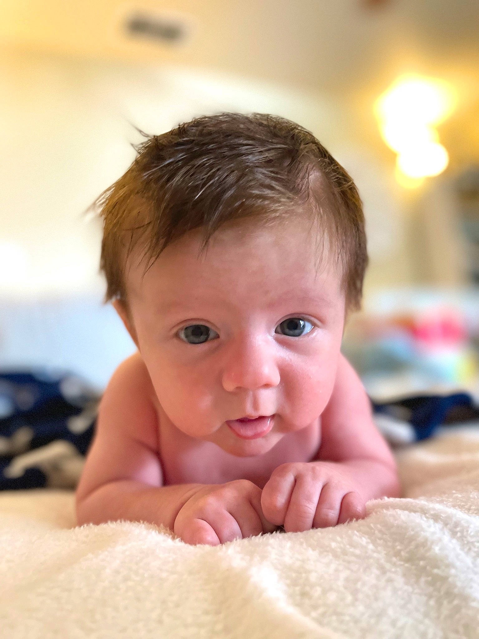 Fisher is registered to the contest to win money with this photo: baby, baby_toddler_clothing, cheek, comfort, eyebrow, eyelash, finger, fun, gesture, happy, iris, linens, lip, mouth, neck, nose, person, skin, smile, thumb