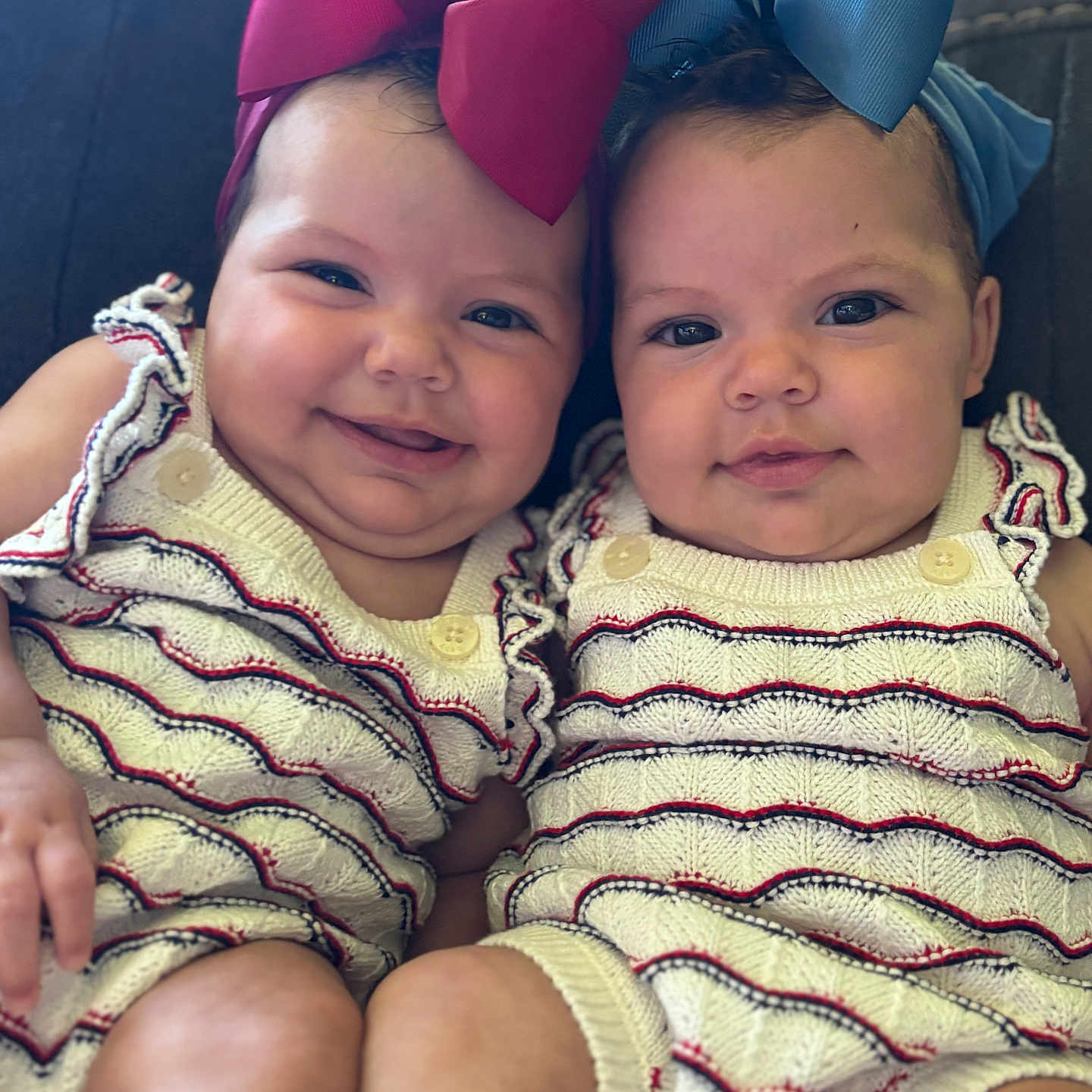 La Naya And Anola joined the competition — help win amazing prizes! baby, bow, child, closeup, couch, cuddling, cute, face, fashion, happy, headband, indoors, infant, knitwear, person, portrait, sitting, smile, toddler, twins