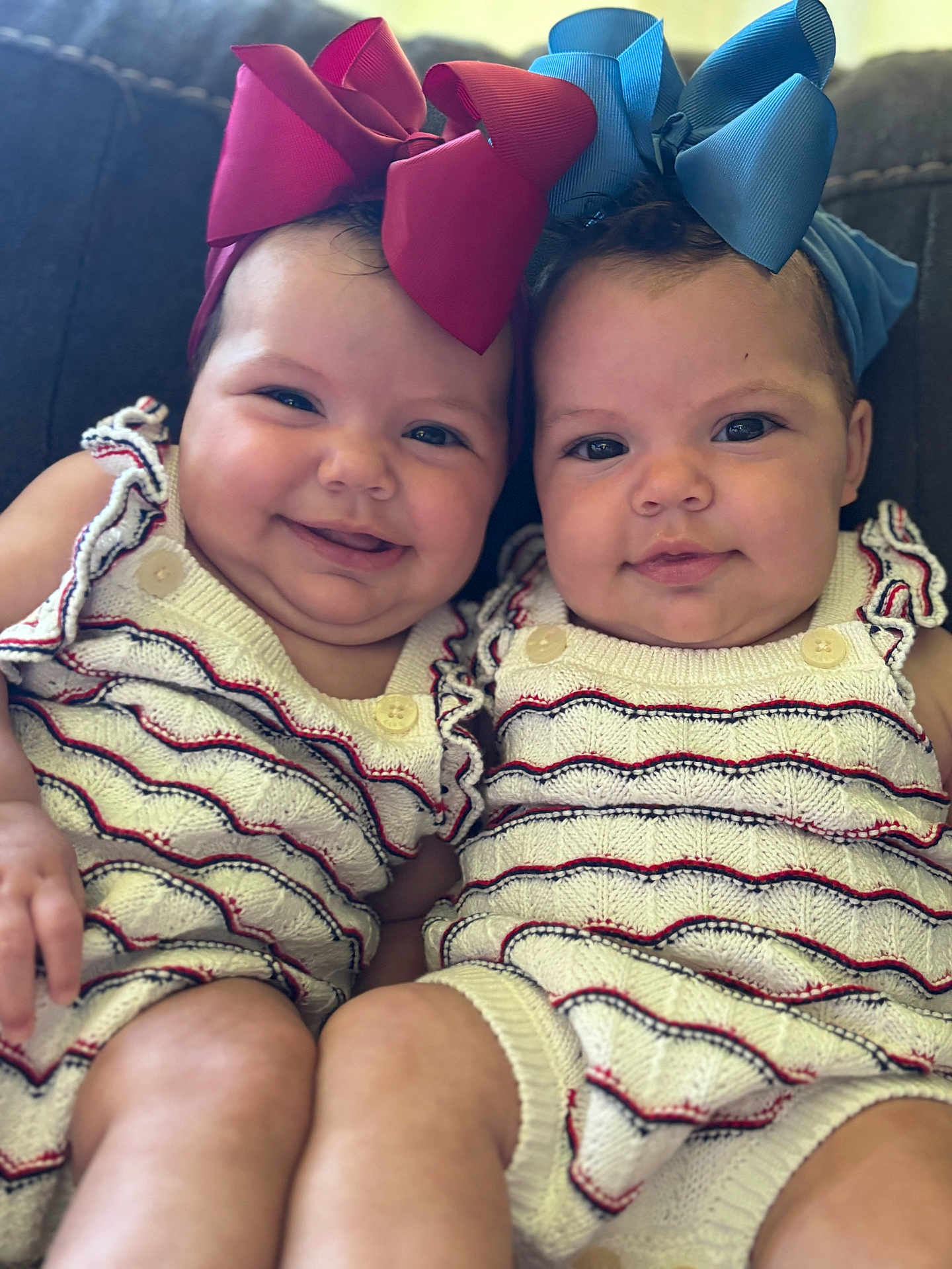 La Naya And Anola joined the competition — help win amazing prizes! baby, twins, bow, headband, smile, cute, knitwear, infant, child, toddler, face, portrait, sitting, happy, couch, cuddling, closeup, indoors, person, fashion