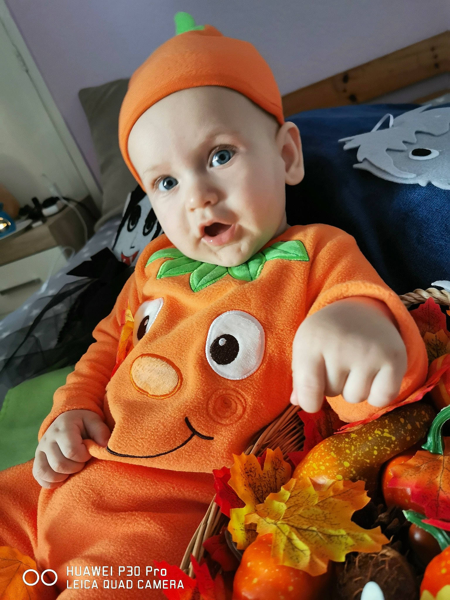 Denis is registered to the contest to win money with this photo: baby, calabaza, child, headwear, person, surprise, toddler, toy, vegetable