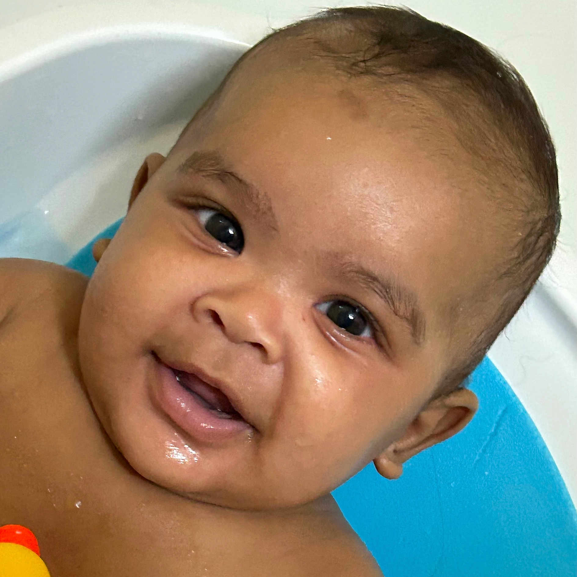 Bryson is registered to the contest to win money with this photo: baby, babylaughing, bathing, bathtub, face, happy, head, person, photography, portrait, smile, tub