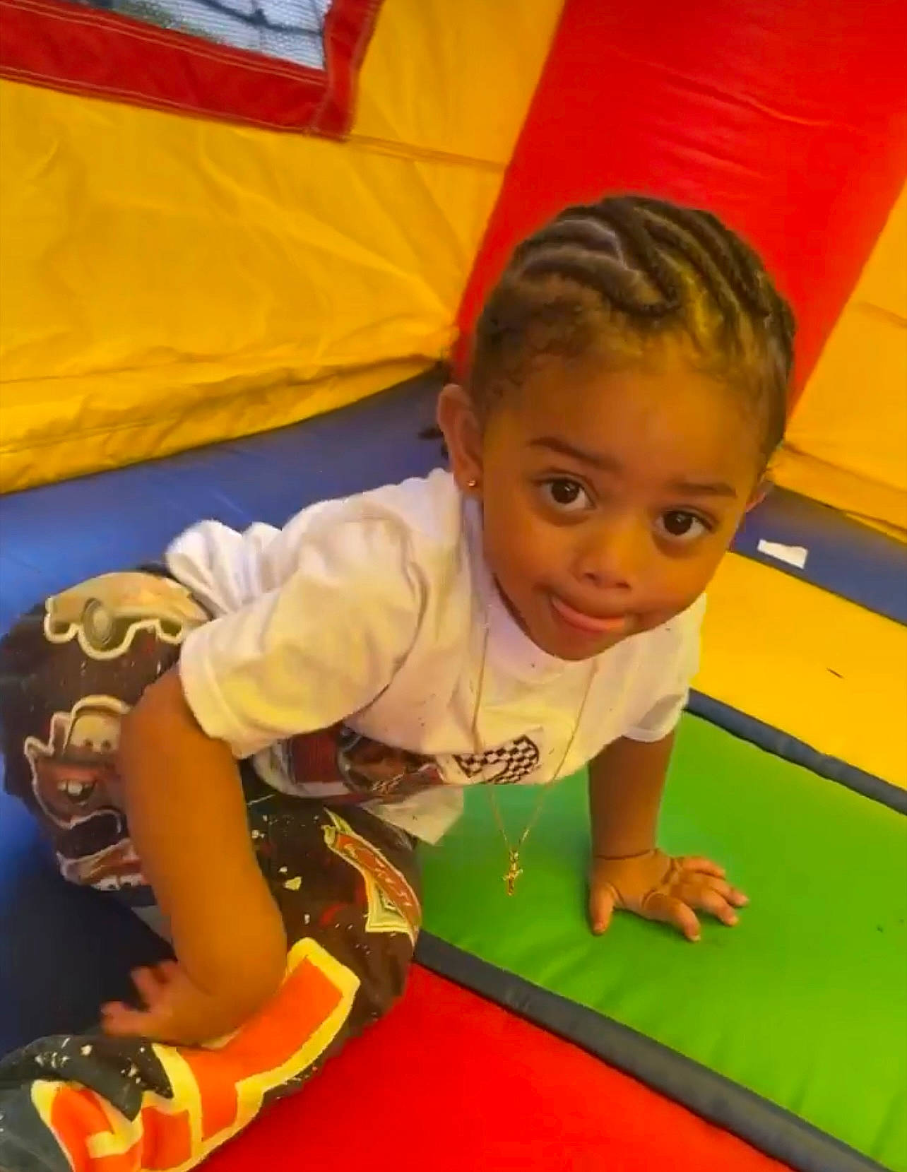 Luis is registered to the contest to win money with this photo: baby, baby_toddler_clothing, child, crawling, flooring, fun, grass, indoor_games_and_sports, leisure, person, play, playground, recreation, room, sitting, t_shirt, toddler