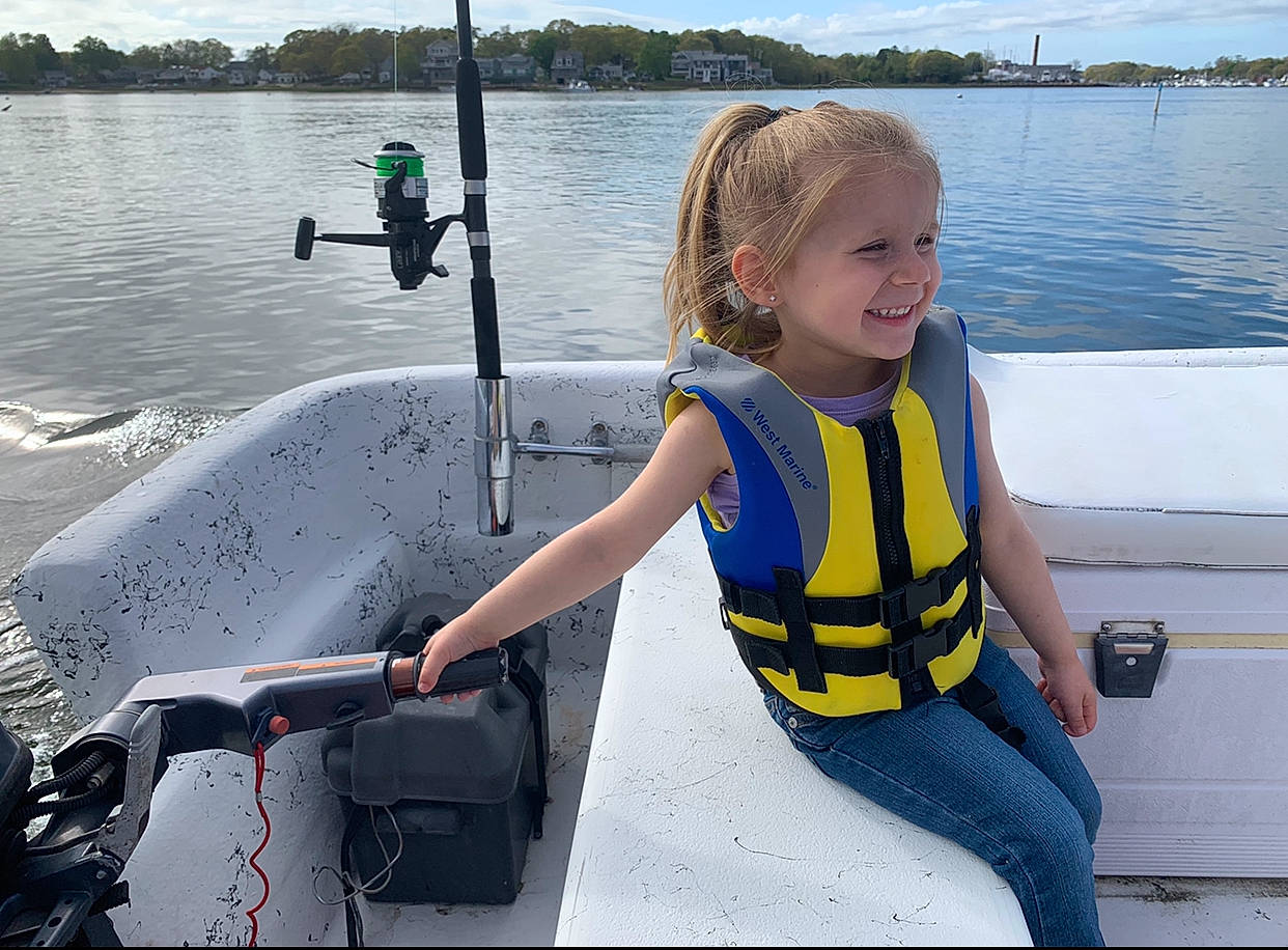 Ellieanna is registered to the contest to win money with this photo: boat, boating, boats_and_boating_equipment_and_supplies, joy, lifejacket, person, personal_protective_equipment, recreation, vacation, vehicle, water, water_transportation, wetsuit