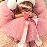 baby, blanket, bow, child, christmas, dress, face, holiday, hospital, indoors, infant, medical_tube, newborn, pink, portrait, santa_hat, sleeping, sparkles, tutu, wrapped