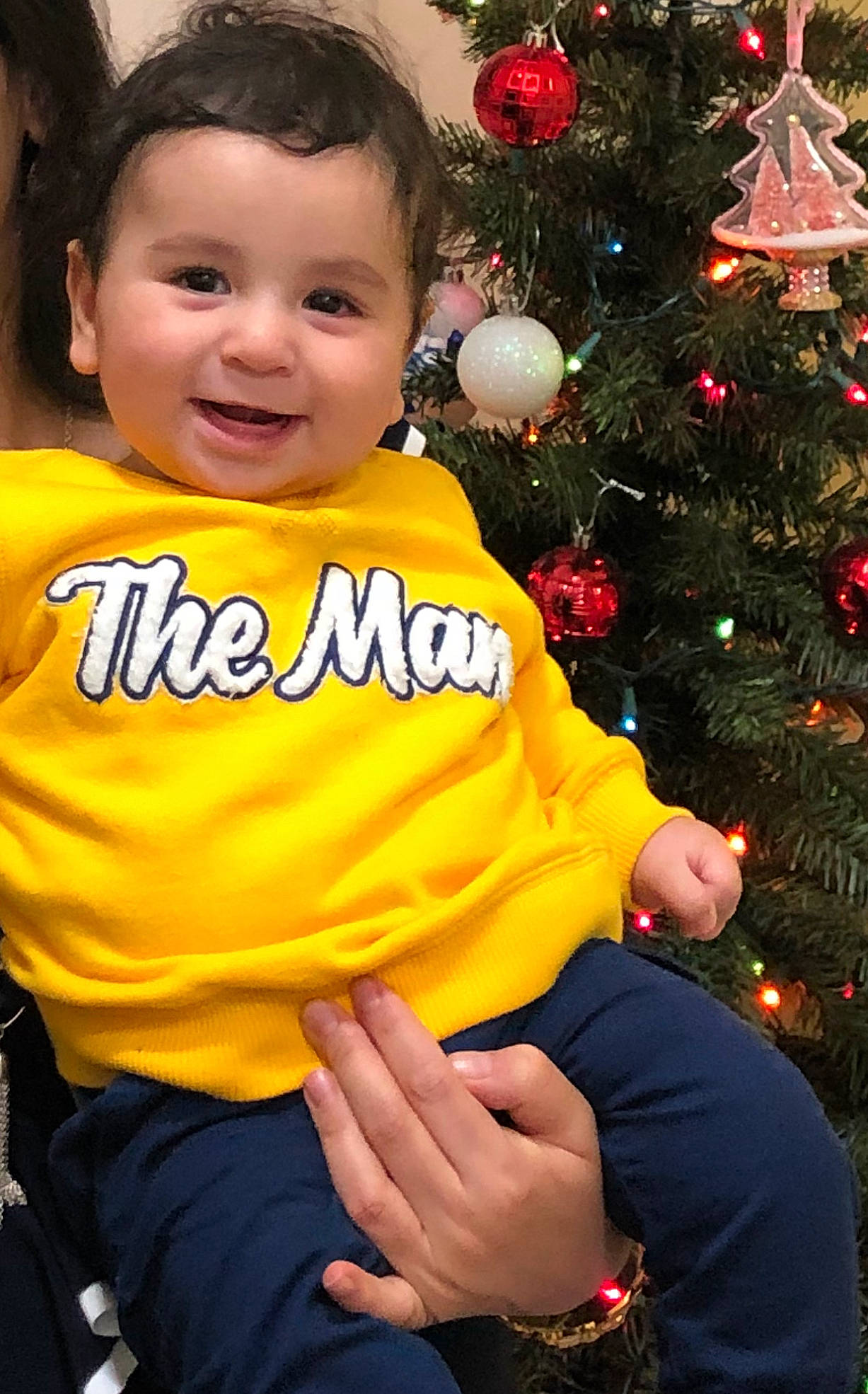 Youssef joined the competition — help win amazing prizes! child, christmas, christmas_decoration, christmas_eve, christmas_ornament, christmas_tree, happy, holiday, interior_design, joy, outerwear, person, smile, toddler, tree, yellow