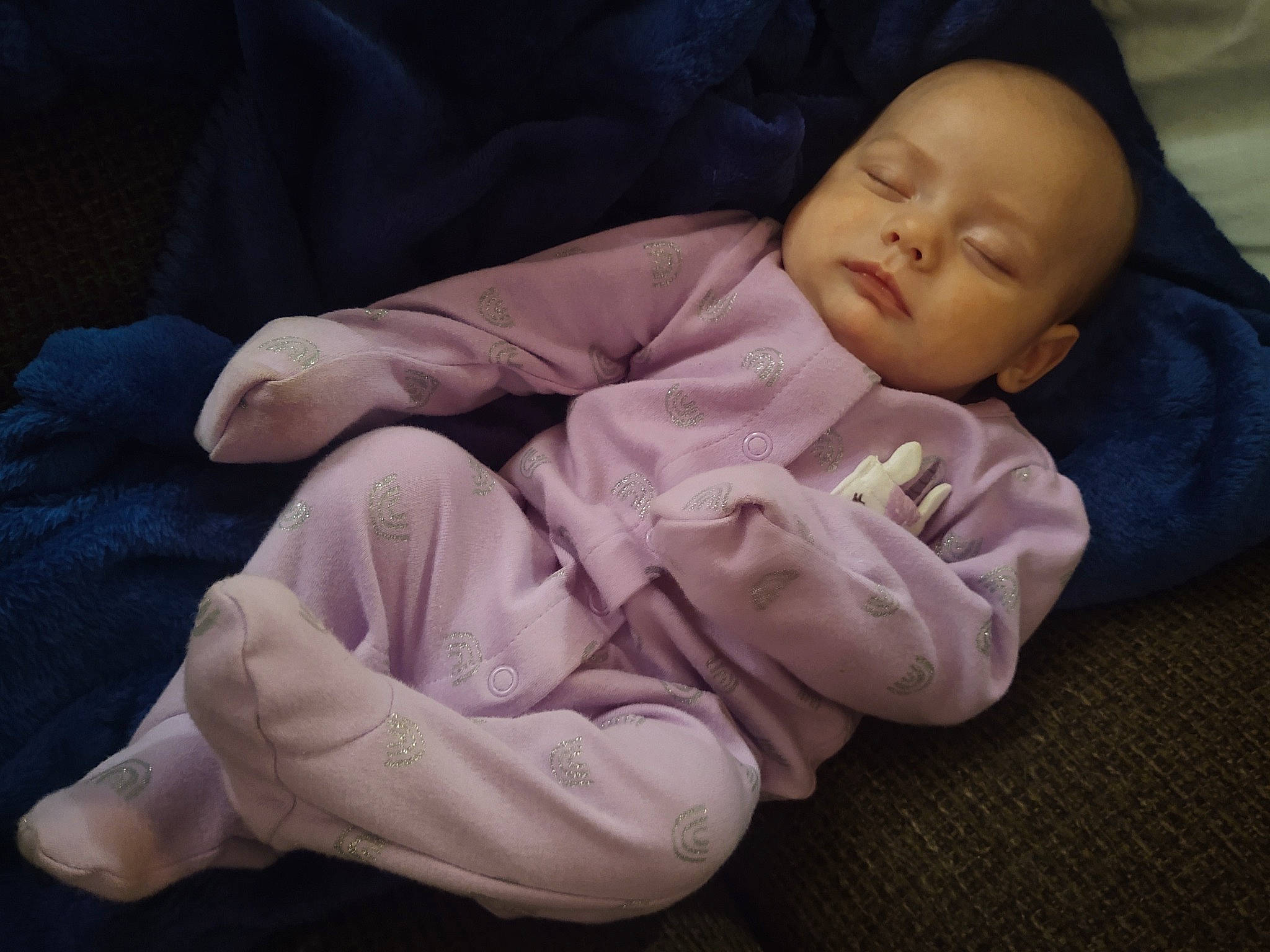 Carlianna is registered to the contest to win money with this photo: baby, baby_products, baby_toddler_clothing, cheek, child, comfort, eye, finger, foot, gesture, human_body, linens, nap, nose, person, room, sitting, sleep, sleeve, thumb