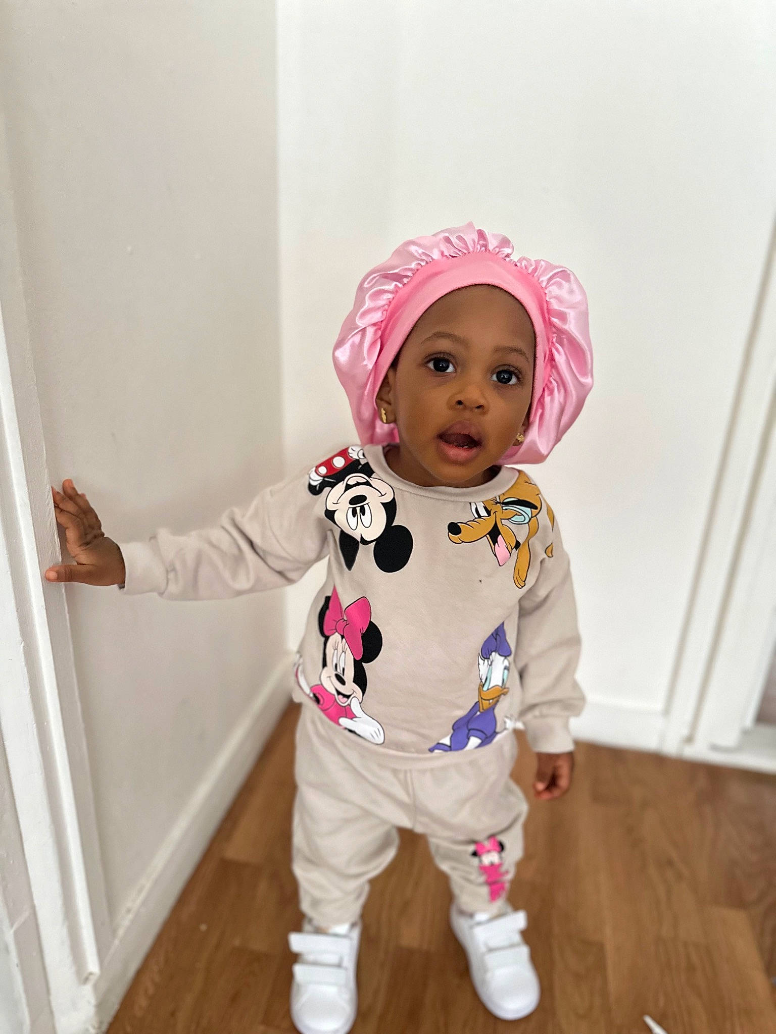 Laiannah participe au concours pour gagner de l'argent avec cette photo : baby, baby_products, baby_toddler_clothing, child, flooring, fun, fur, happy, hardwood, headgear, headwear, jacket, magenta, pattern, person, personal_protective_equipment, pink, room, sleeve, smile