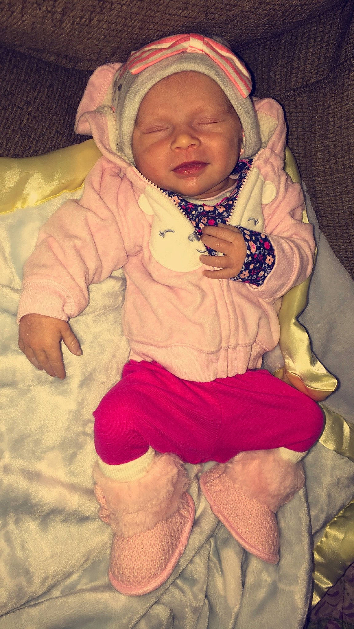 Alaya is registered to the contest to win money with this photo: baby, cheek, child, fun, outerwear, person, pink, skin, smile, toddler