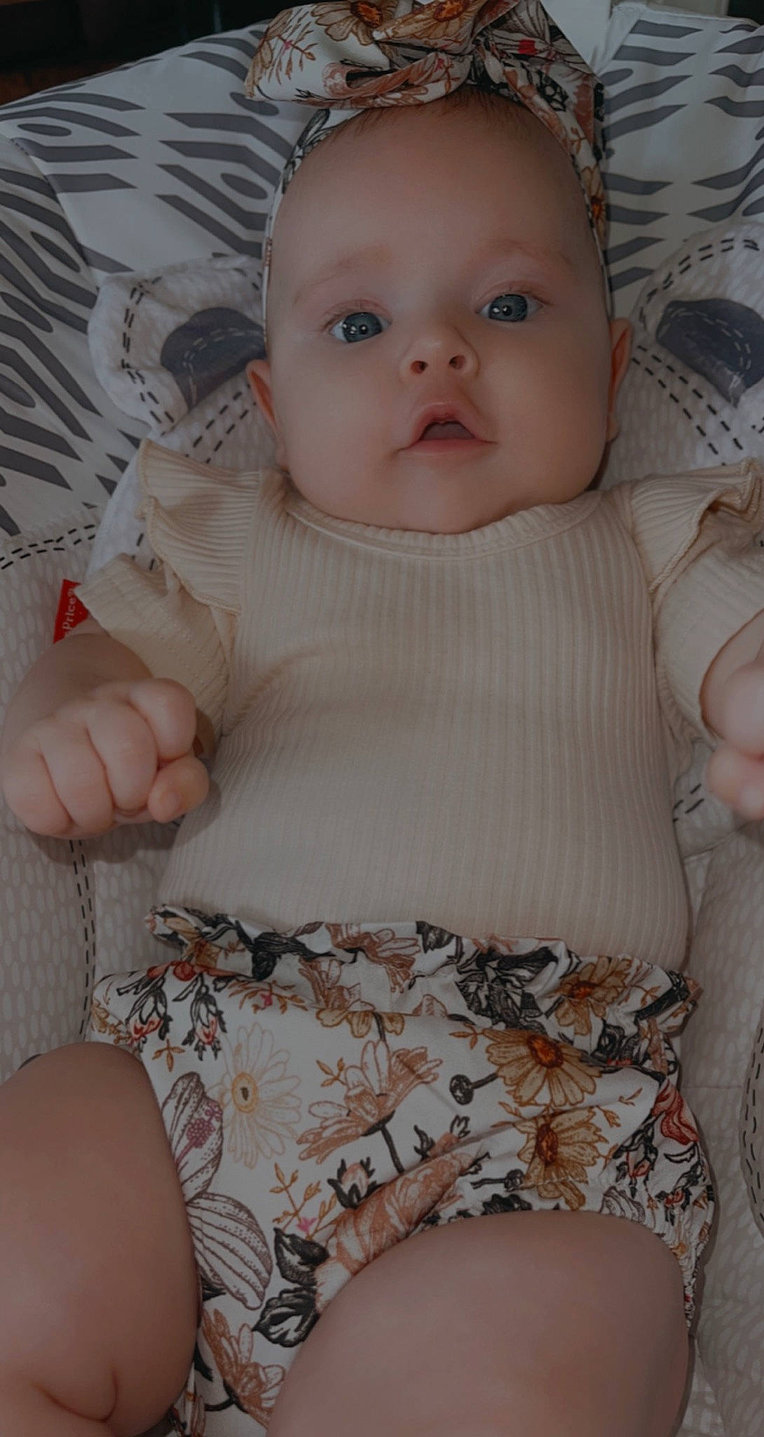 Charlotte is registered to the contest to win money with this photo: arm, baby, baby_toddler_clothing, cheek, comfort, eye, hand, head, iris, joint, leg, lip, mouth, neck, organ, person, skin, sleeve, stomach, textile