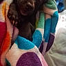 Roxie is registered to the contest to win money with this photo: animal, blanket, closeup, colorful, comfort, cozy, cute, dog, fur, indoors, paw, pet, polka_dot, puppy, resting, sleeping, small, snug, soft, warm