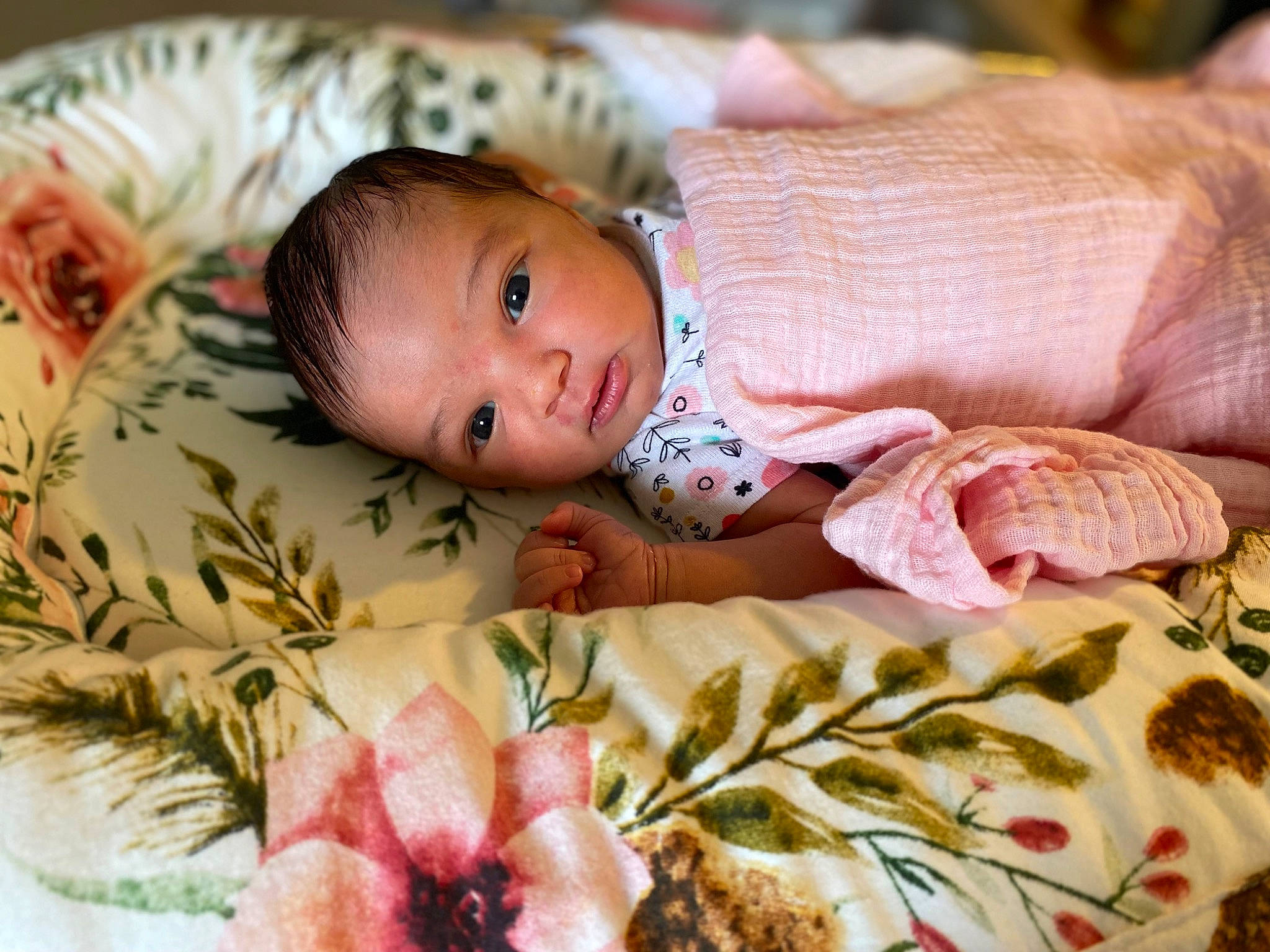 Camilla is registered to the contest to win money with this photo: baby, baby_toddler_clothing, cheek, child, close_up, comfort, dress, eyelash, finger, grass, hand, iris, linens, lip, person, pink, product, skin, textile, toddler