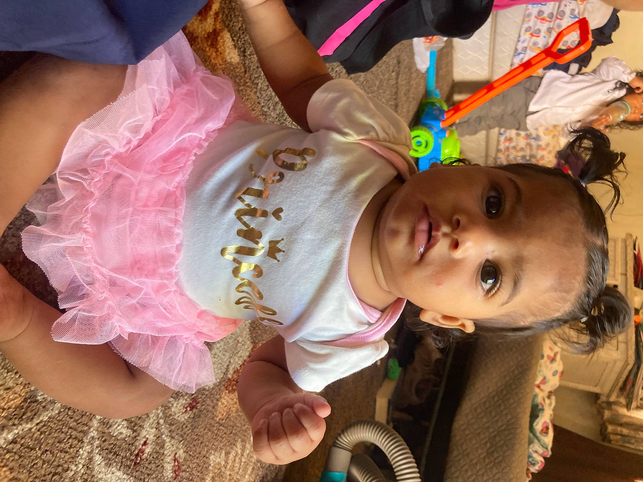 Marianna is registered to the contest to win money with this photo: baby, baby_toddler_clothing, cheek, child, costume, dress, embellishment, event, eyelash, fashion_accessory, fun, happy, magenta, person, pink, skin, toddler, tradition