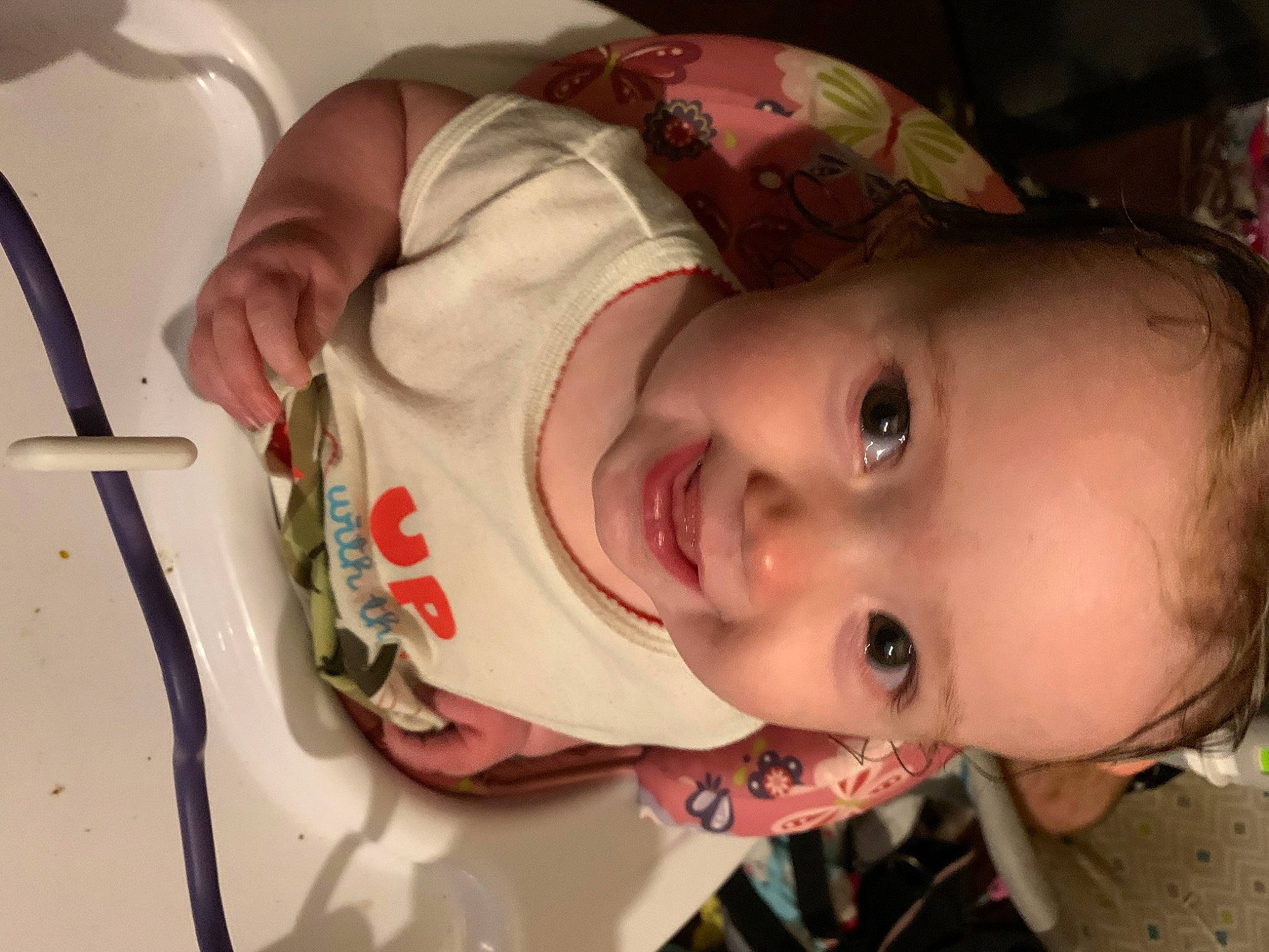 Brooklyn is registered to the contest to win money with this photo: baby, cheek, chin, ear, eye, eyebrow, eyelash, forehead, hat, headgear, human_body, iris, joy, lip, mouth, neck, nose, person, skin, sleeve