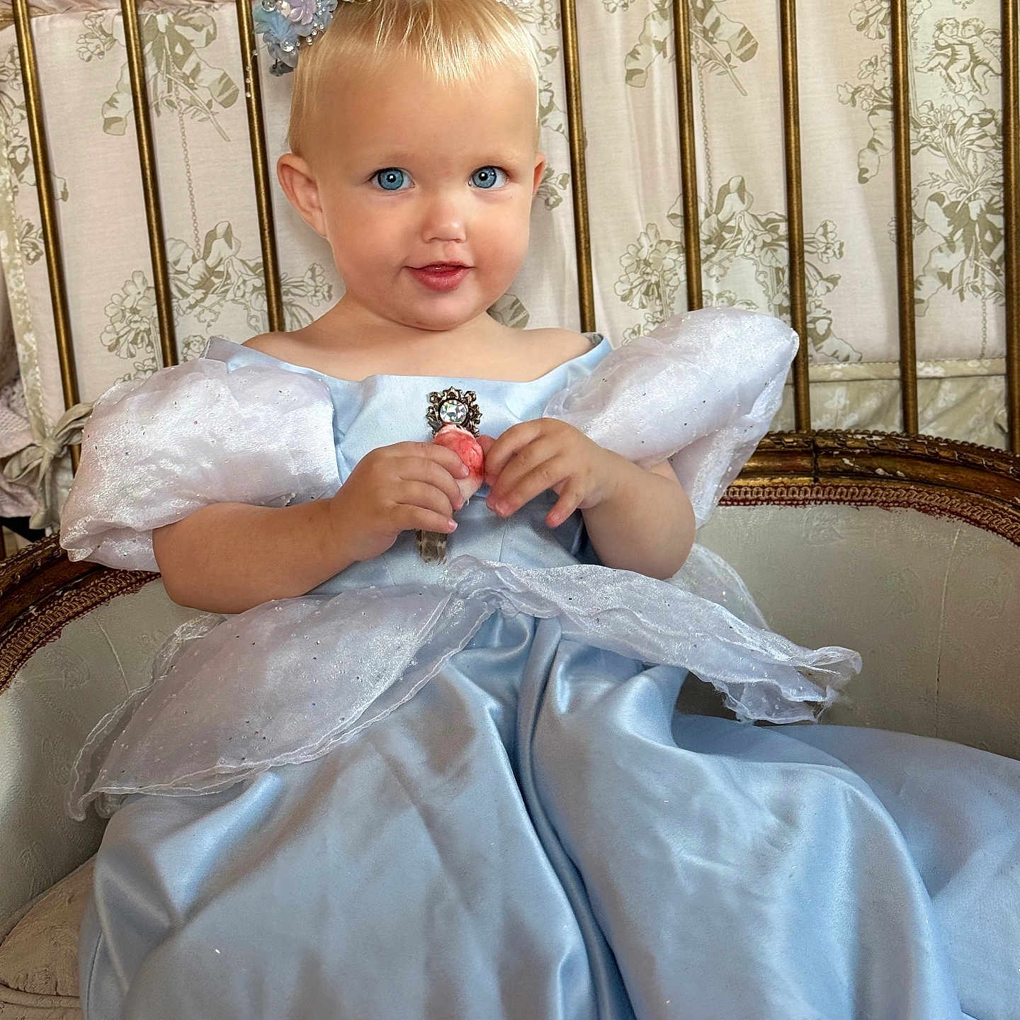 Viviana joined the competition — help win amazing prizes! baby, blue_dress, blue_eyes, chair, child, costume, crown, cute, dress, face, flower, furniture, indoor, portrait, princess, sitting, smile, tiara, toddler, vintage