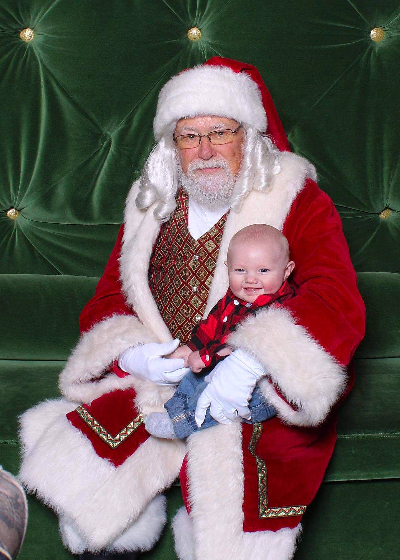 Brett joined the competition — help win amazing prizes! baby, child, christmas, christmas_eve, fictional_character, fur, headwear, holiday, human_body, joy, lap, person, santa_claus, toddler