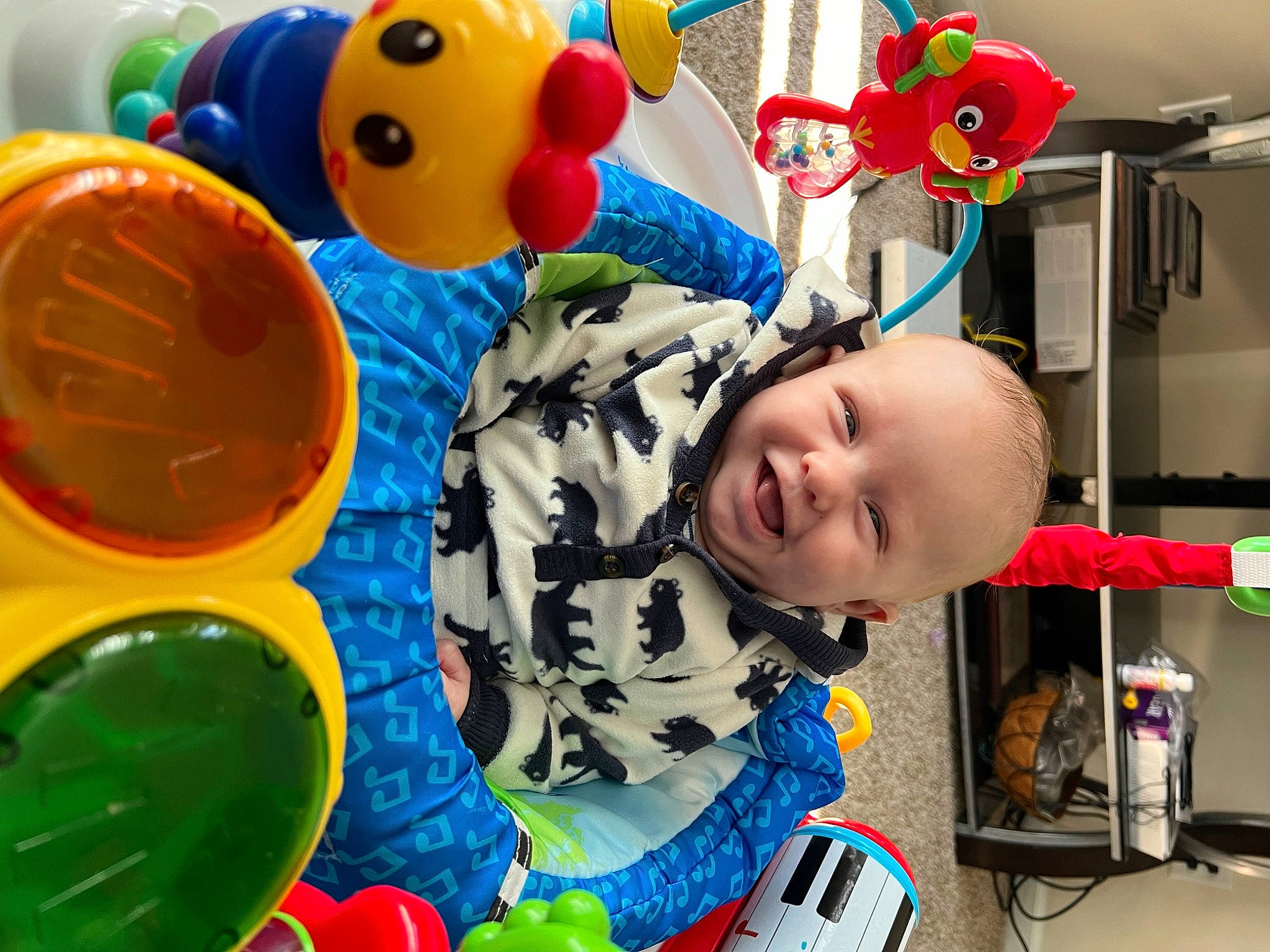 Azaiah joined the competition — help win amazing prizes! baby, baby_playing_with_toys, baby_toddler_clothing, baby_toys, blue, child, event, facial_expression, fun, happy, kindergarten, leisure, party_supply, person, plastic, play, product, smile, t_shirt, toddler