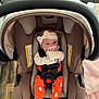 Emberlynn joined the competition — help win amazing prizes! baby, car_seat, pacifier, headband, orange_pants, polar_bear_pattern, infant, straps, footwear_none, indoors, cushion, fabric, child, cute, newborn, seatbelt, soft_toys, blanket, floor, living_room