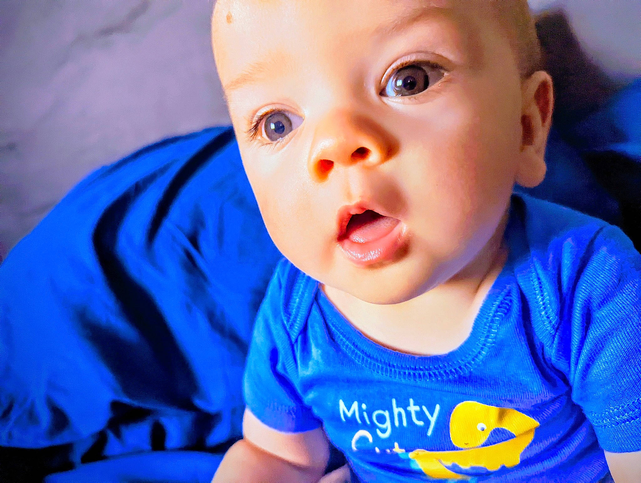 Rowan is registered to the contest to win money with this photo: baby, baby_toddler_clothing, blue, cheek, cool, ear, eyebrow, eyelash, finger, happy, human_body, iris, lip, mouth, neck, nose, person, skin, sleeve, smile