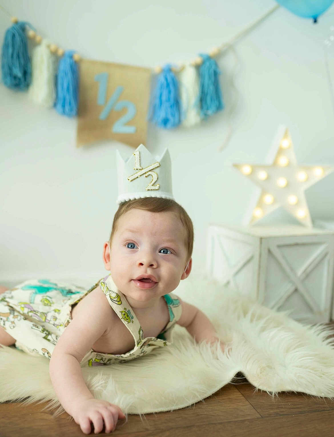 Zayven is registered to the contest to win money with this photo: accessories, baby, birthdaycake, cake, clothing, costume, cream, crown, dessert, face, food, hat, head, indoors, jewelry, partyhat, people, person, photography, portrait