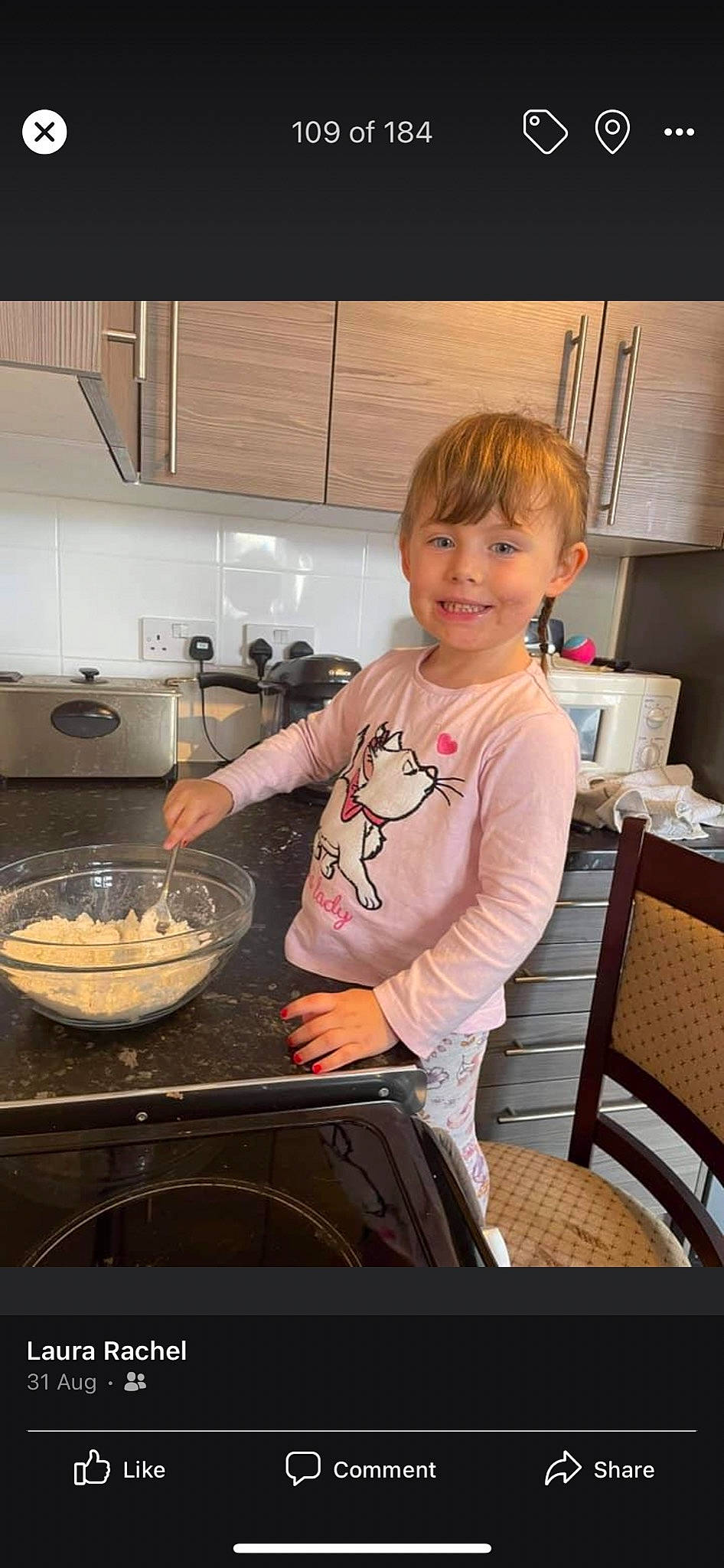 Elayah is registered to the contest to win money with this photo: cabinetry, chair, chef, cooking, cooktop, cookware_and_bakeware, countertop, food, gas_stove, home_appliance, homemaker, joy, kitchen, kitchen_appliance, kitchen_stove, major_appliance, person, recipe, smile, stove