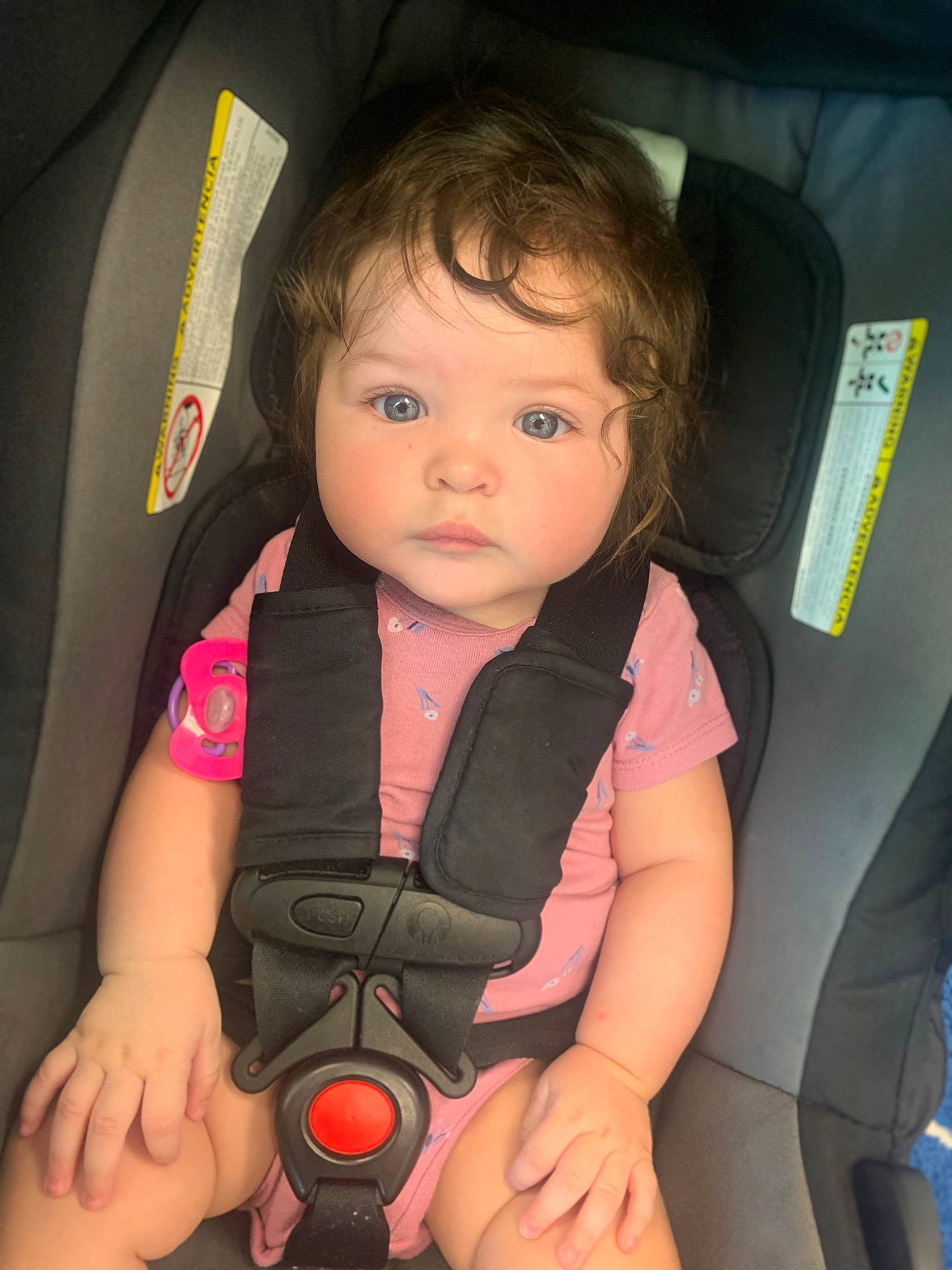 Azalea is registered to the contest to win money with this photo: arm, auto_part, baby, baby_carriage, baby_toddler_clothing, car_seat, cheek, chin, comfort, communication_device, finger, hand, iris, mouth, nail, person, seat_belt, skin, thumb, toddler