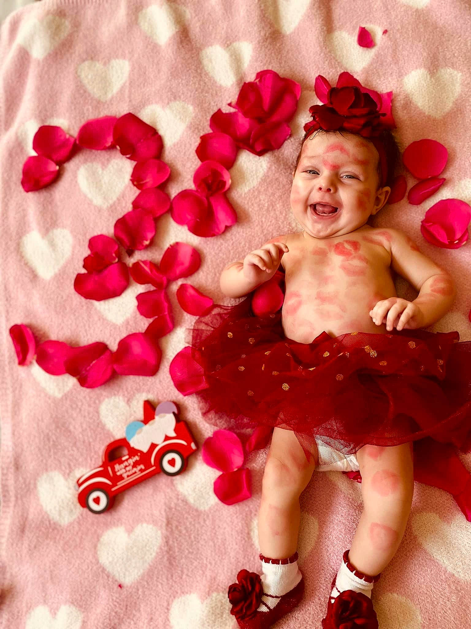 Madalynn joined the competition — help win amazing prizes! baby_toddler_clothing, child, event, fictional_character, font, gesture, happy, leg, magenta, mythical_creature, pattern, peach, person, petal, pink, red, smile, textile, thigh, thumb