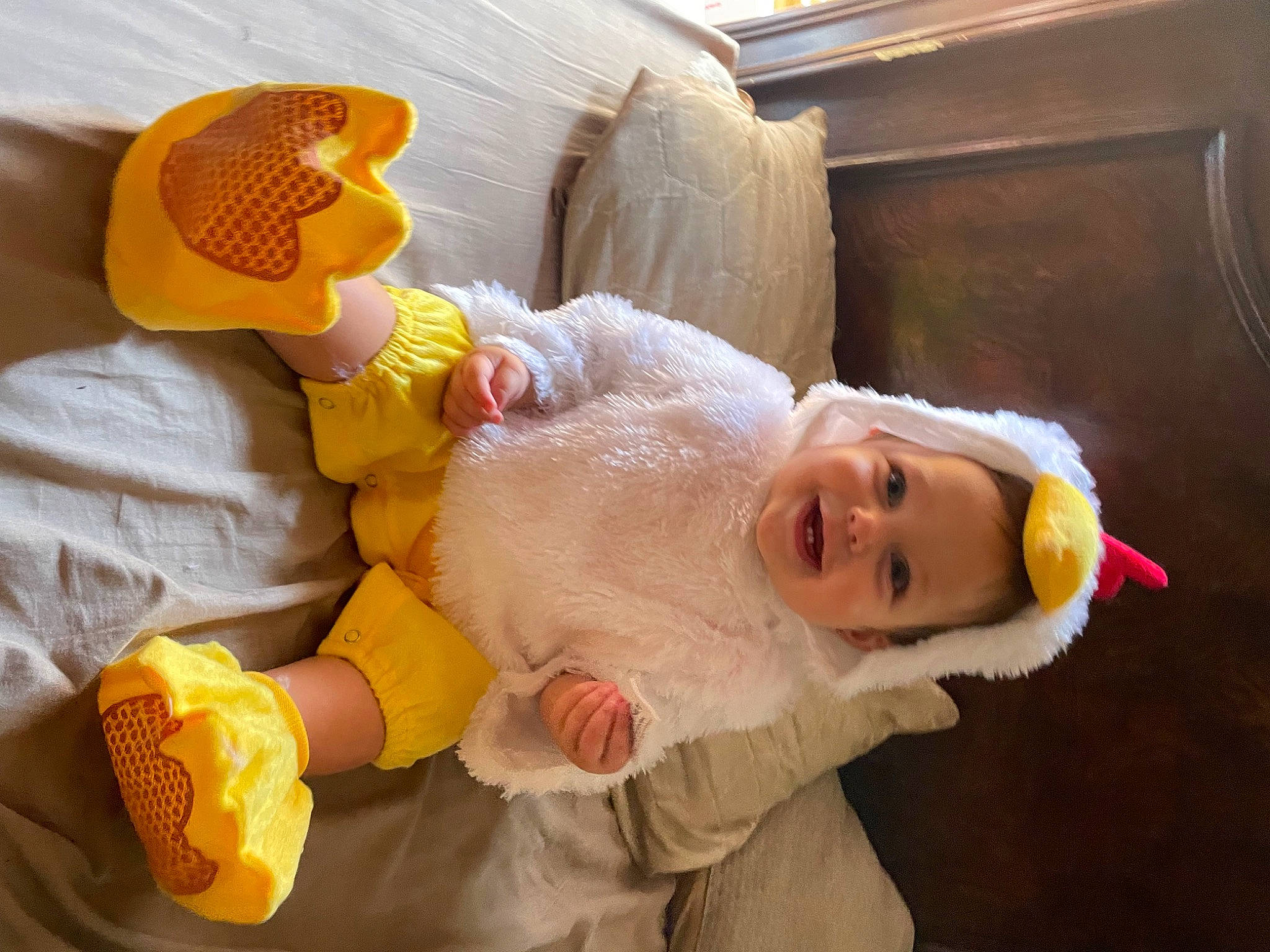 Madalynn is registered to the contest to win money with this photo: baby, child, comfort, event, fun, fur, happy, joy, linens, orange, person, plush, room, smile, stuffed_toy, toddler, toy