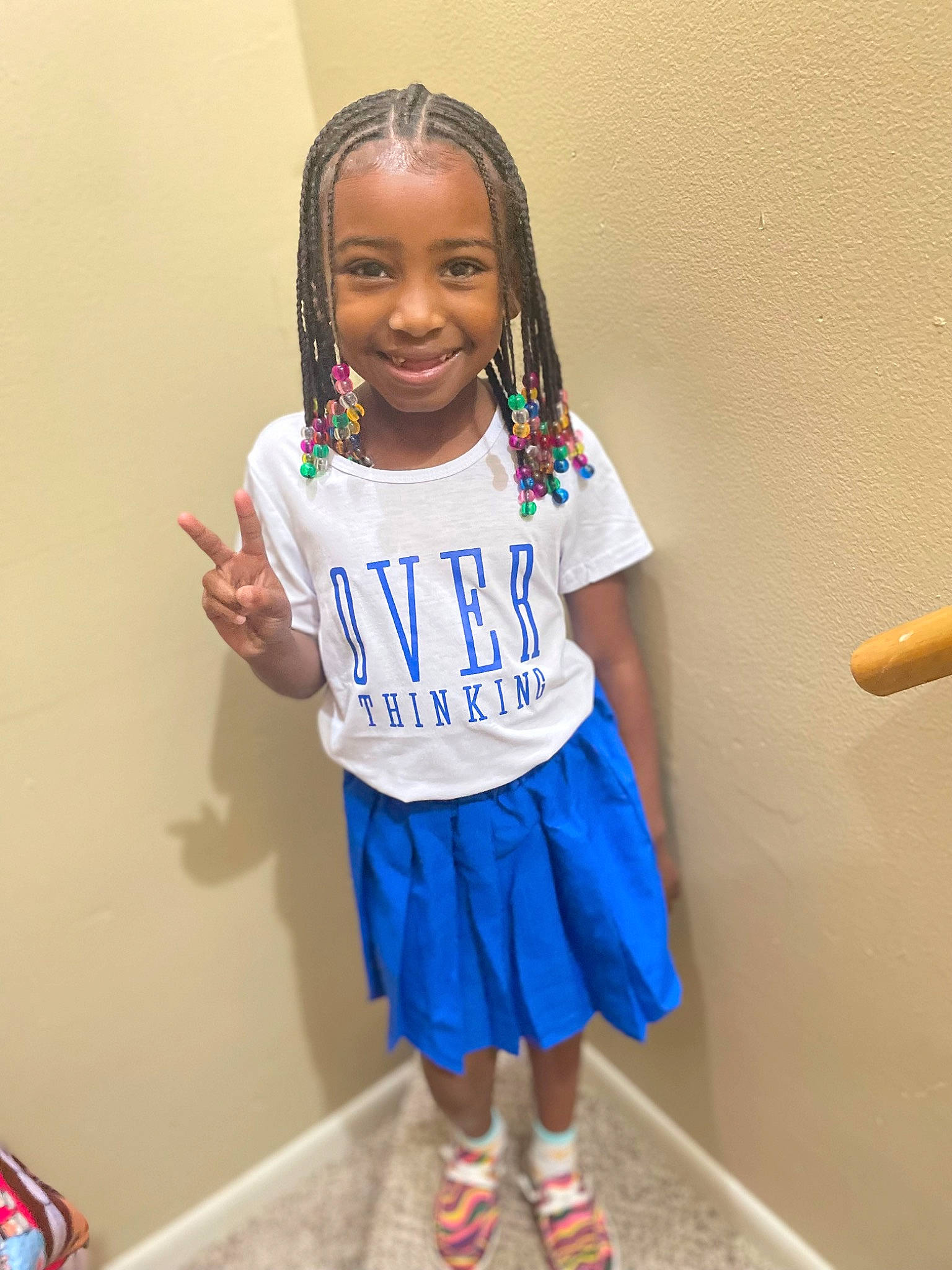 Alayshia is registered to the contest to win money with this photo: child, electric_blue, face, fun, happy, jersey, joint, joy, knee, person, room, shorts, shoulder, sleeve, smile, sock, sportswear, standing, t_shirt, thigh
