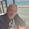 Claude D.