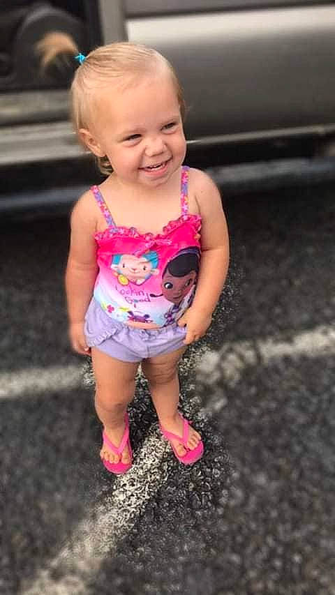 Kaylynn is registered to the contest to win money with this photo: baby, child, child_model, dress, fun, joy, person, pink, play, shoe, skin, smile, summer, toddler, vacation