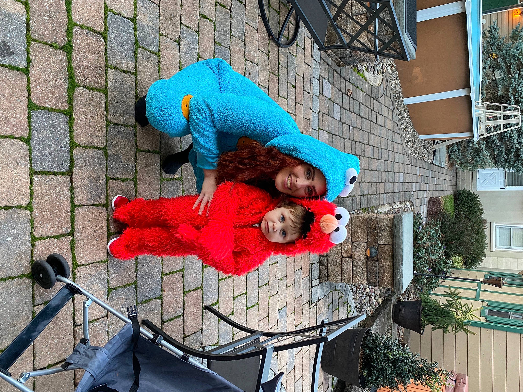 Nolan is registered to the contest to win money with this photo: blue, building, carmine, child, electric_blue, facade, fun, headwear, joy, leisure, pattern, person, plant, street_fashion, tire, tree