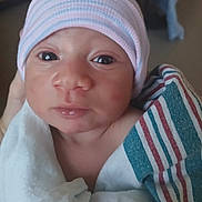Jeremiah joined the competition — help win amazing prizes! newborn, baby, infant, face, hat, blanket, wrapped, hospital, closeup, portrait, cute, young, skin, eyes, person, newborn_baby, headwear, soft_lighting, indoor, human