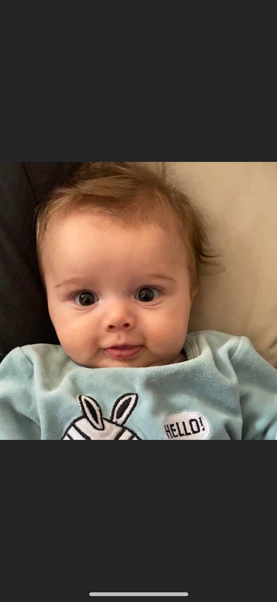 Marco participe au concours pour gagner de l'argent avec cette photo : baby, baby_toddler_clothing, cheek, child, comfort, eyelash, flash_photography, happy, human_body, iris, lip, neck, nose, person, portrait, portrait_photography, sitting, sleeve, smile, t_shirt