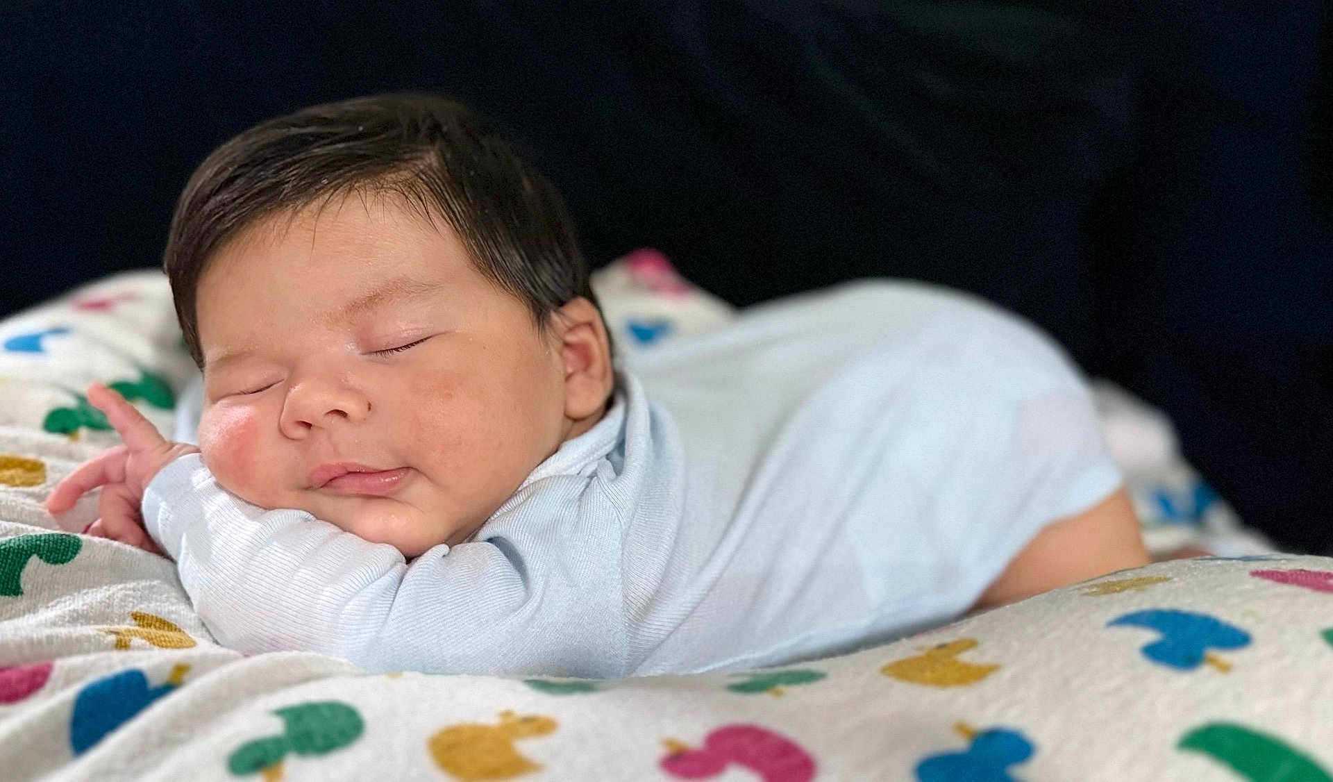 Alex joined the competition — help win amazing prizes! baby, sleeping, infant, blanket, pattern, colorful, peaceful, cute, cozy, soft, face, head, clothing, rest, portrait, child, newborn, indoors, comfort, toddler