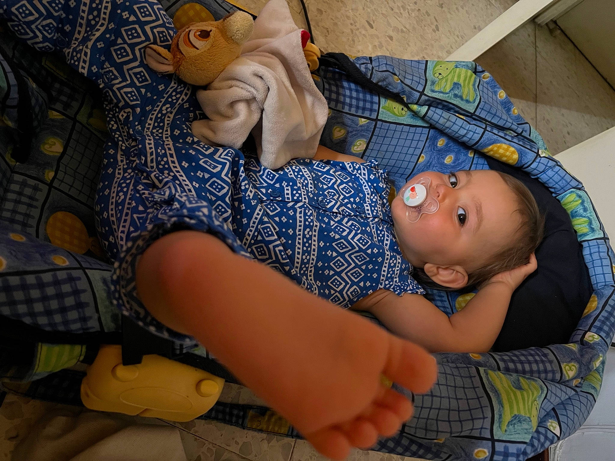 Manon participe au concours pour gagner de l'argent avec cette photo : art, baby, child, comfort, fun, hat, human_body, human_leg, joint, lap, leisure, mouth, pattern, person, room, sitting, textile, thigh, toddler, toy