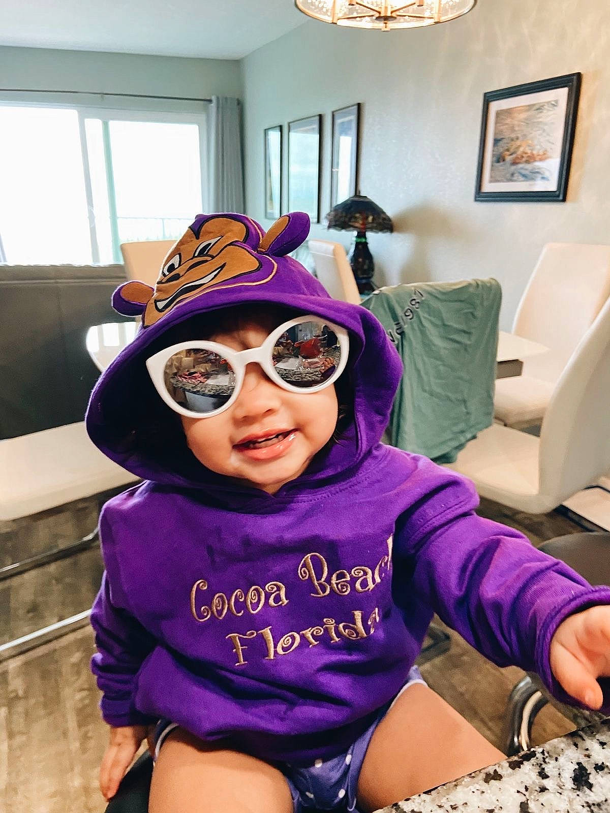 Nevaeh is registered to the contest to win money with this photo: cap, cool, eyewear, fashion, goggles, happy, hat, headgear, headwear, leisure, person, picture_frame, pink, purple, sleeve, smile, sunglasses, textile, toddler, violet