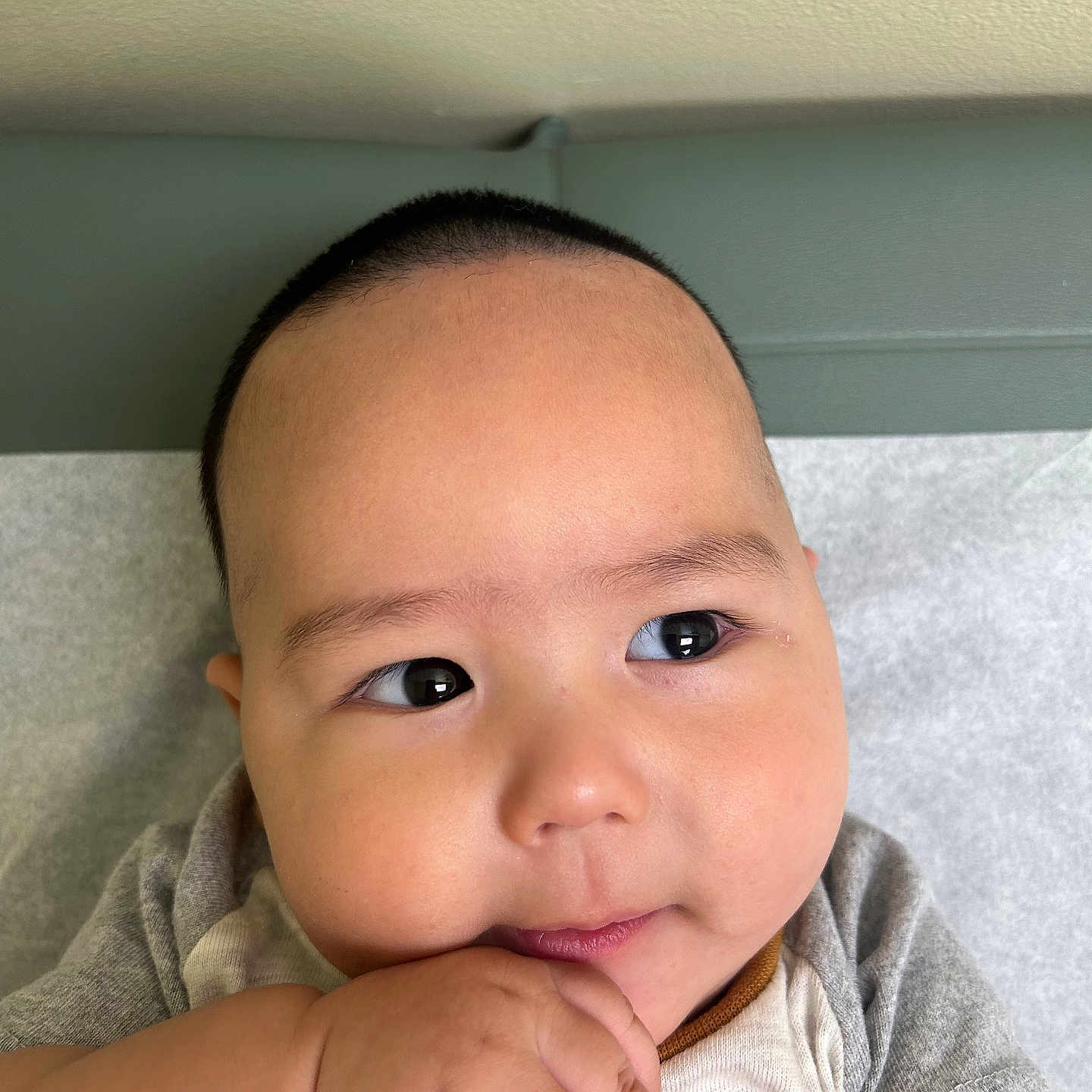 Aman joined the competition — help win amazing prizes! baby, bodypart, clothing, couch, face, finger, furniture, hand, happy, head, knitwear, mouth, newborn, person, photography, portrait, selfie, skin, smile, sweater