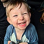Silas joined the competition — help win amazing prizes! child, toddler, smiling, toy, blue_shirt, car_interior, happy, person, cute, face, human, baby_teeth, casual_clothing, seat, light, hair, hand, expression, closeup, indoors