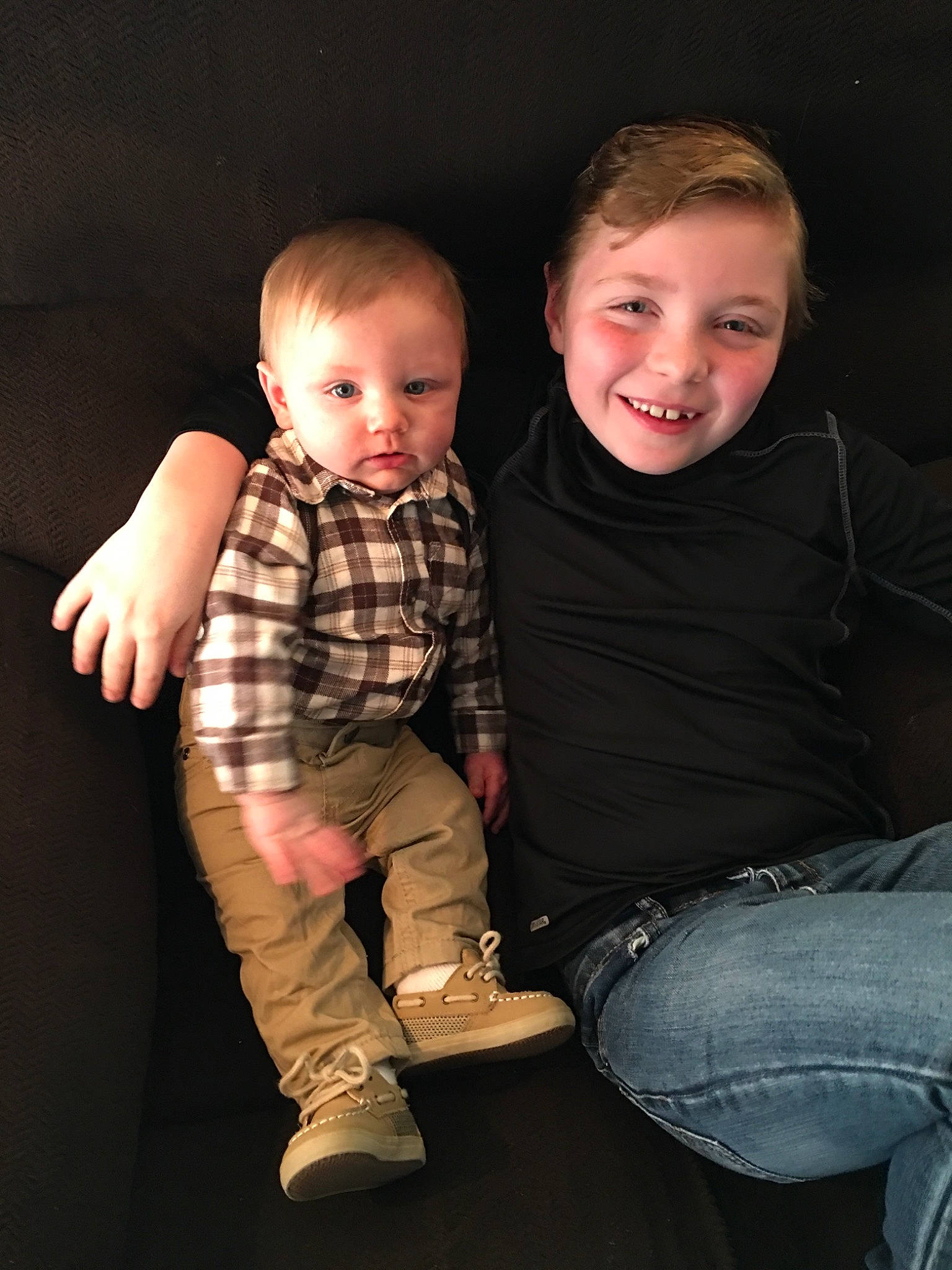 Rhylynn joined the competition — help win amazing prizes! arm, cheek, child, design, eye, face, fun, head, human_body, iris, joy, leg, pattern, people, person, plaid, sibling, sitting, skin, smile