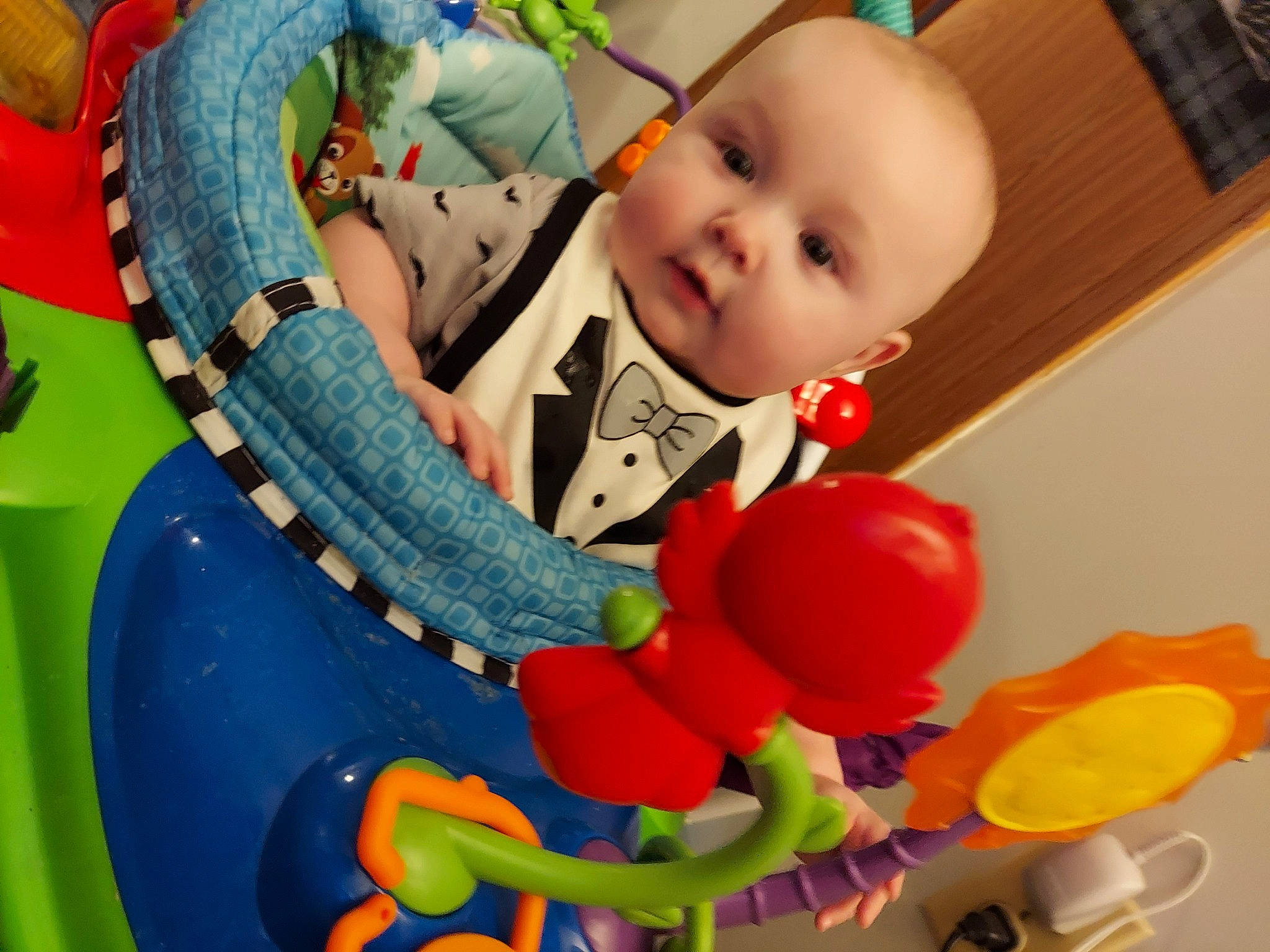 Jorden is registered to the contest to win money with this photo: baby, baby_playing_with_toys, baby_products, baby_toddler_clothing, baby_toys, balloon, cheek, child, event, fun, green, happy, infant_bed, organ, person, play, room, sitting, toddler, toy