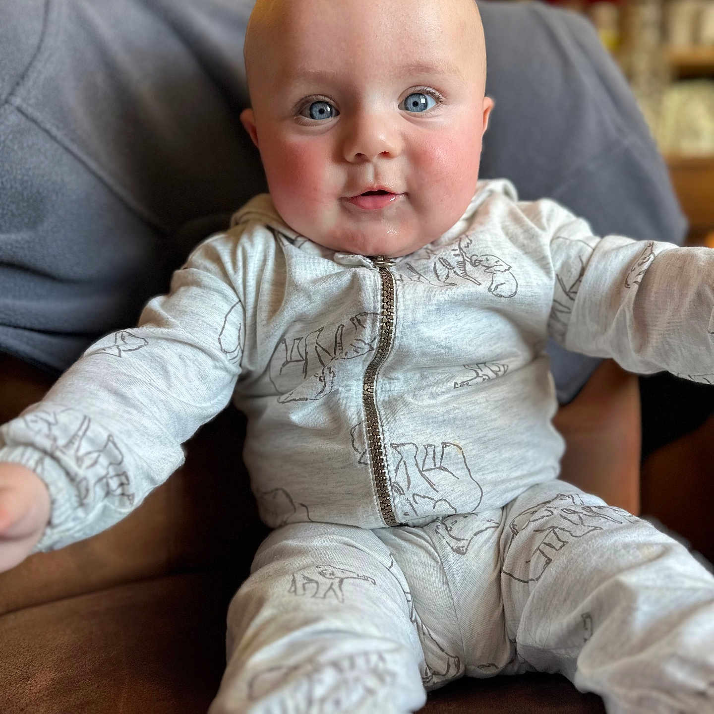 Wyatt joined the competition — help win amazing prizes! baby, bodypart, clothing, coat, couch, cushion, face, finger, furniture, hand, happy, head, homedecor, jacket, jeans, pants, person, photography, portrait, sitting