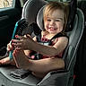 baby, car_interior, car_seat, child, clothing, cute, foot, hairbrush, happy, indoors, nail_polish, person, playful, portrait, redhead, seat, seatbelt, smile, toddler, young_child