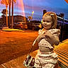 Leah joined the competition — help win amazing prizes! child, toddler, girl, portrait, outdoor, evening, sunset, palm_trees, sidewalk, street, parking_lot, cars, fence, dress, ruffles, hair_bow, smiling, suitcase, travel, colorful_lighting