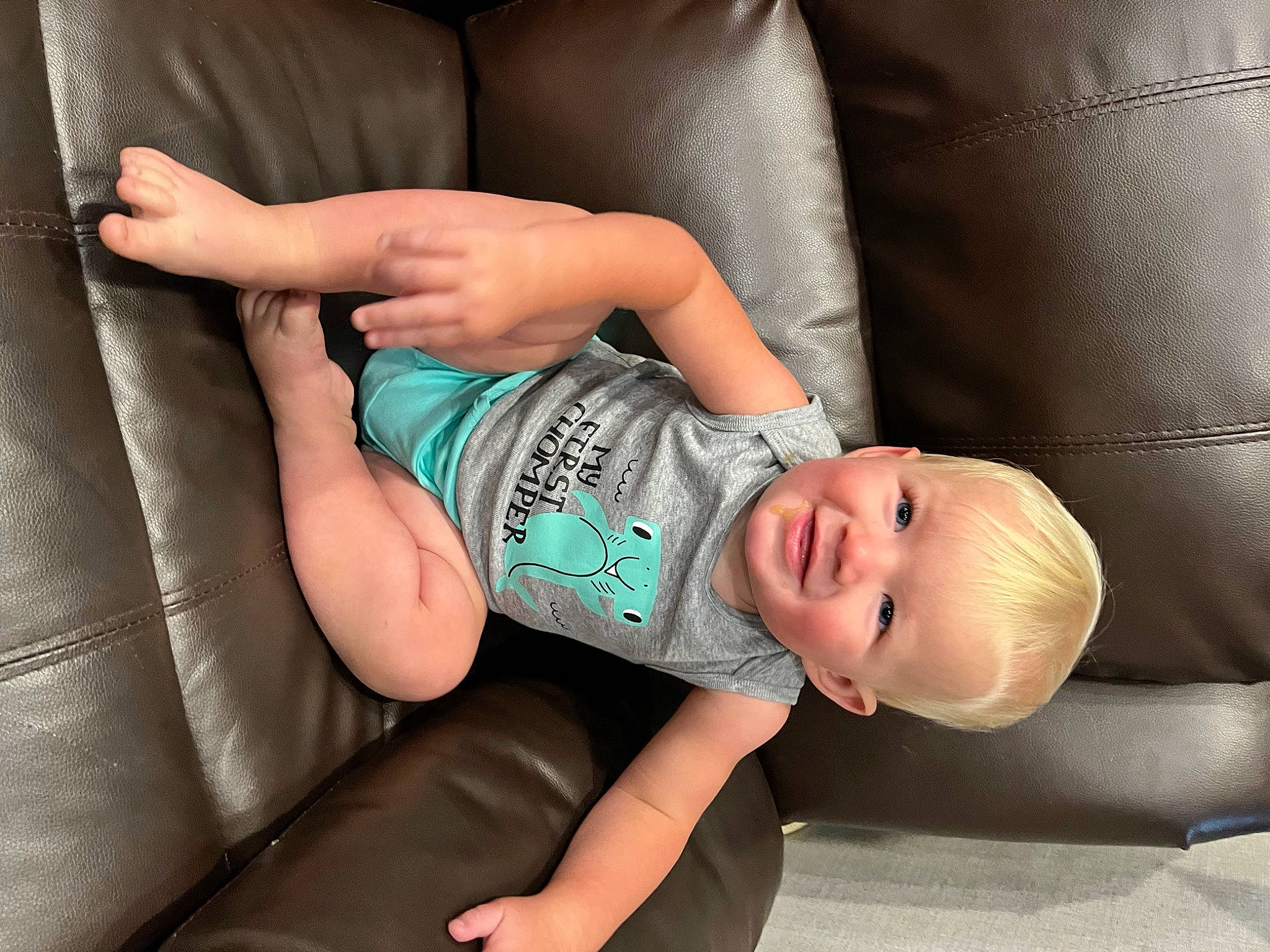 Kaiden is registered to the contest to win money with this photo: abdomen, baby, baby_products, baby_toddler_clothing, chest, child, comfort, elbow, eye, foot, human_leg, joint, joy, knee, leg, nail, person, sitting, thigh, thumb