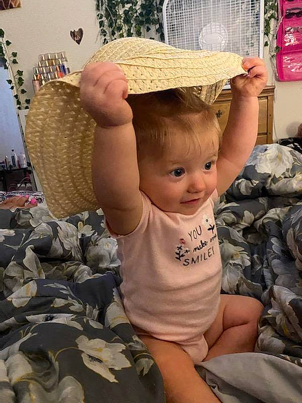 Heaven is registered to the contest to win money with this photo: baby, baby_toddler_clothing, basket, cap, child, cool, eye, fashion_accessory, finger, fun, grass, hairstyle, happy, hat, headgear, leisure, person, sitting, smile, sun_hat