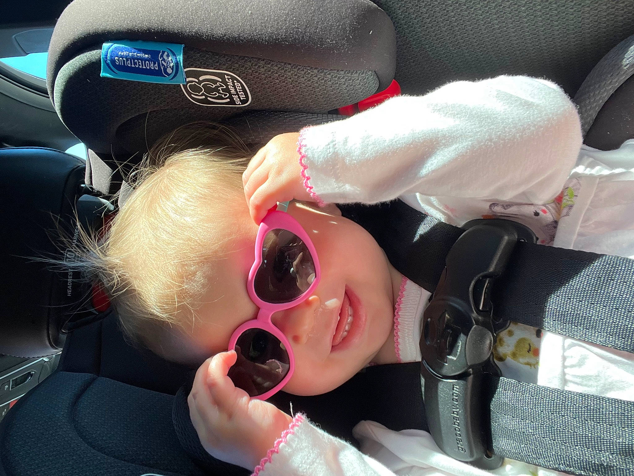 Kora joined the competition — help win amazing prizes! audio_equipment, auto_part, automotive_design, car_seat, child, event, eyelash, eyewear, fashion_accessory, finger, fun, gesture, glasses, goggles, happy, nail, person, personal_protective_equipment, steering_wheel, sunglasses