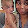 Luca is registered to the contest to win money with this photo: baby, adult, holding, indoor, portrait, person, face, expression, skin, clothing, hand, diaper, couch, home, woman, child, parent, casual, closeup, smile