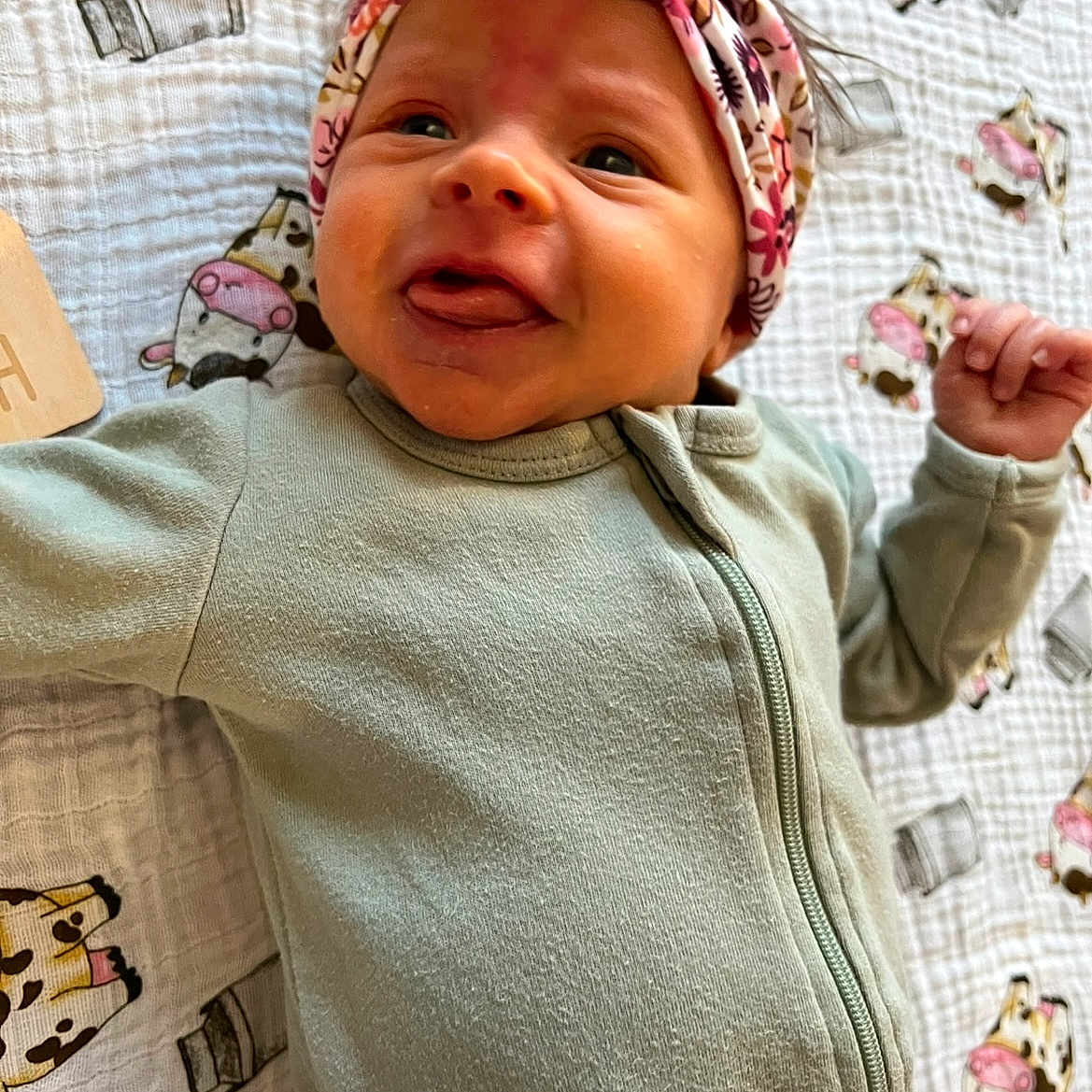 Ella joined the competition — help win amazing prizes! baby, bodypart, bonnet, cap, clothing, coat, face, finger, hand, hat, head, hood, hoodie, jacket, knitwear, person, photography, portrait, sweater, sweatshirt