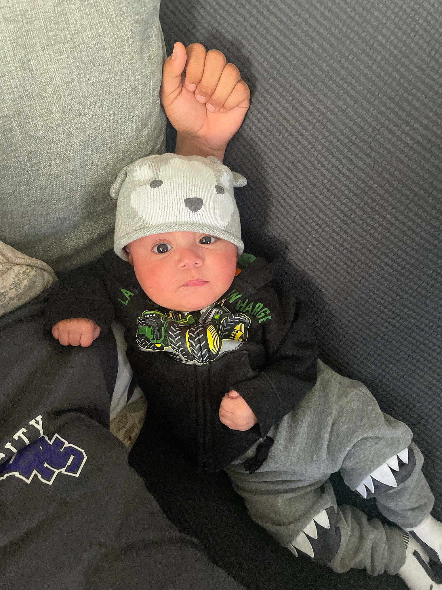 Ezekiel joined the competition — help win amazing prizes! baby, baby_products, baby_toddler_clothing, beanie, cap, cheek, child, comfort, fashion_accessory, flash_photography, gesture, happy, headwear, helmet, person, personal_protective_equipment, sitting, sleeve, sock, t_shirt